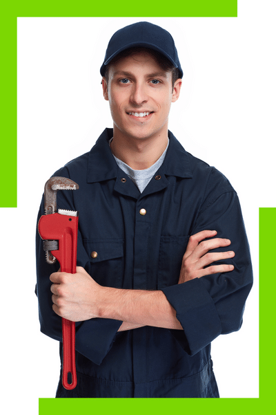 A plumber holding a wrench in front of a green background. Ezi Plumbing.