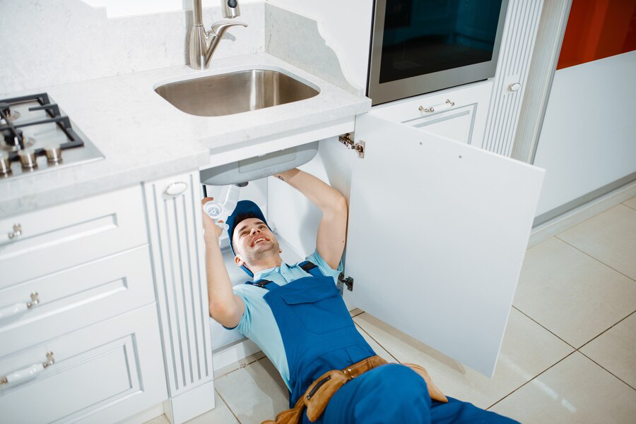 male-plumber-uniform-installing-drain-pipe-kitchen-handywoman-with-toolbag-repair-sink-sanitary-equipment-service-home_266732-22725.png